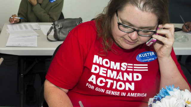 A Moms Demand Action volunteer makes calls at a phonebanking event