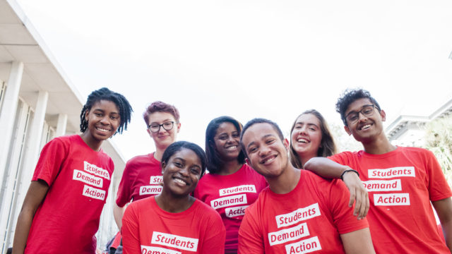Group photo of seven smiling Students Demand Action volunteers